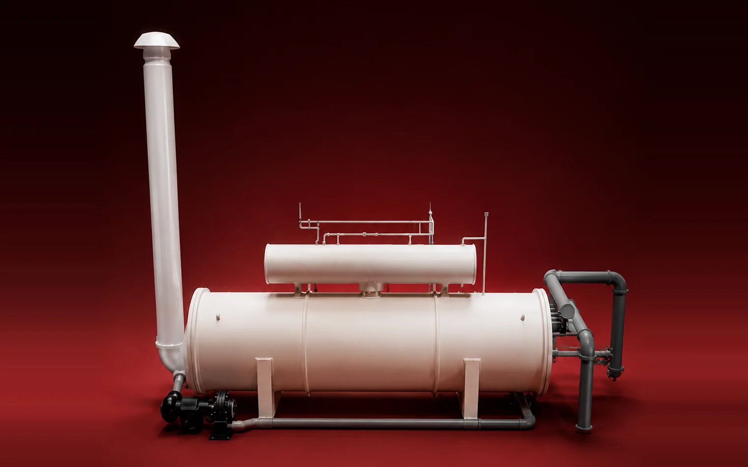 A water bath heater, stack and process pipework, photographed on a red ground